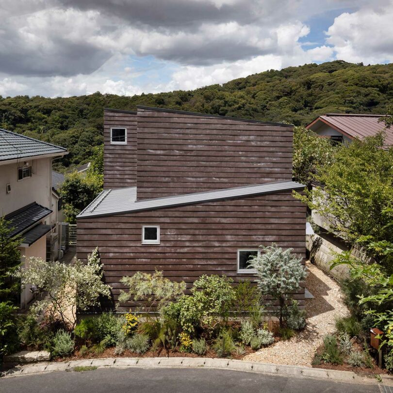 exterior view of modern house with dark wood exterior