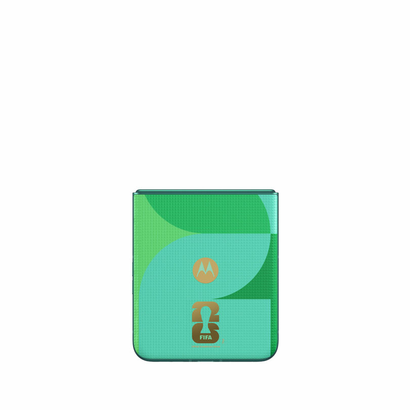 A green Motorola flip phone featuring the FIFA World Cup logo on its front cover.